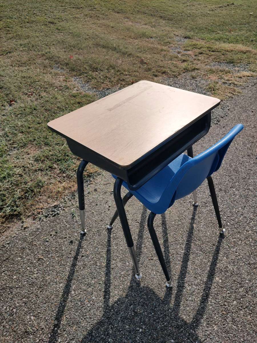 metal school desk with a chair or a end table