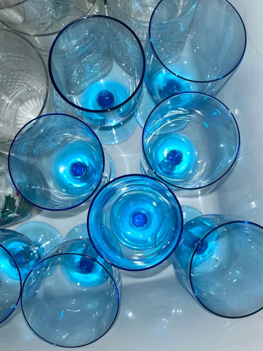 blue wine glass Pfaltzgraff and Poppytrail dishes Pink glass