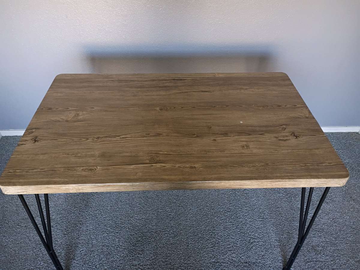 is a beautiful brown table  and I am selling it for 48