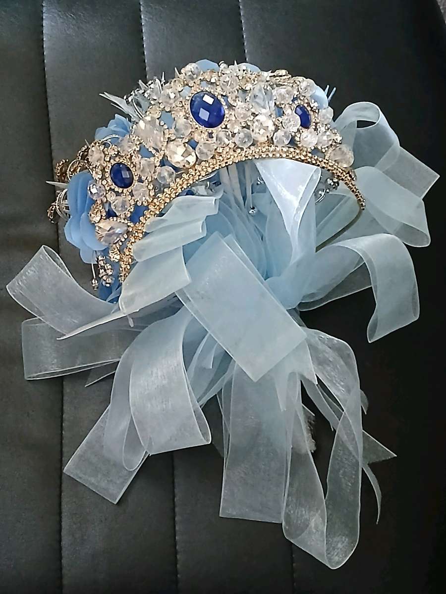 A Dress Flowers And A Crown