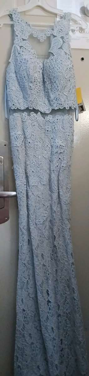 A Dress Flowers And A Crown