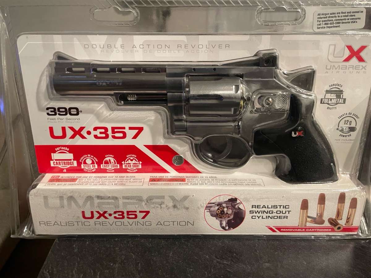 UX357 Brand new never opened realistic