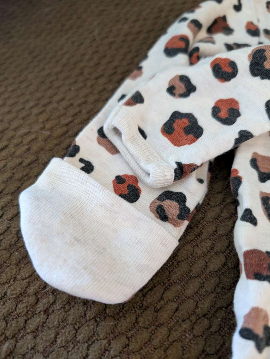 Leopard print baby sleepsuit with feet