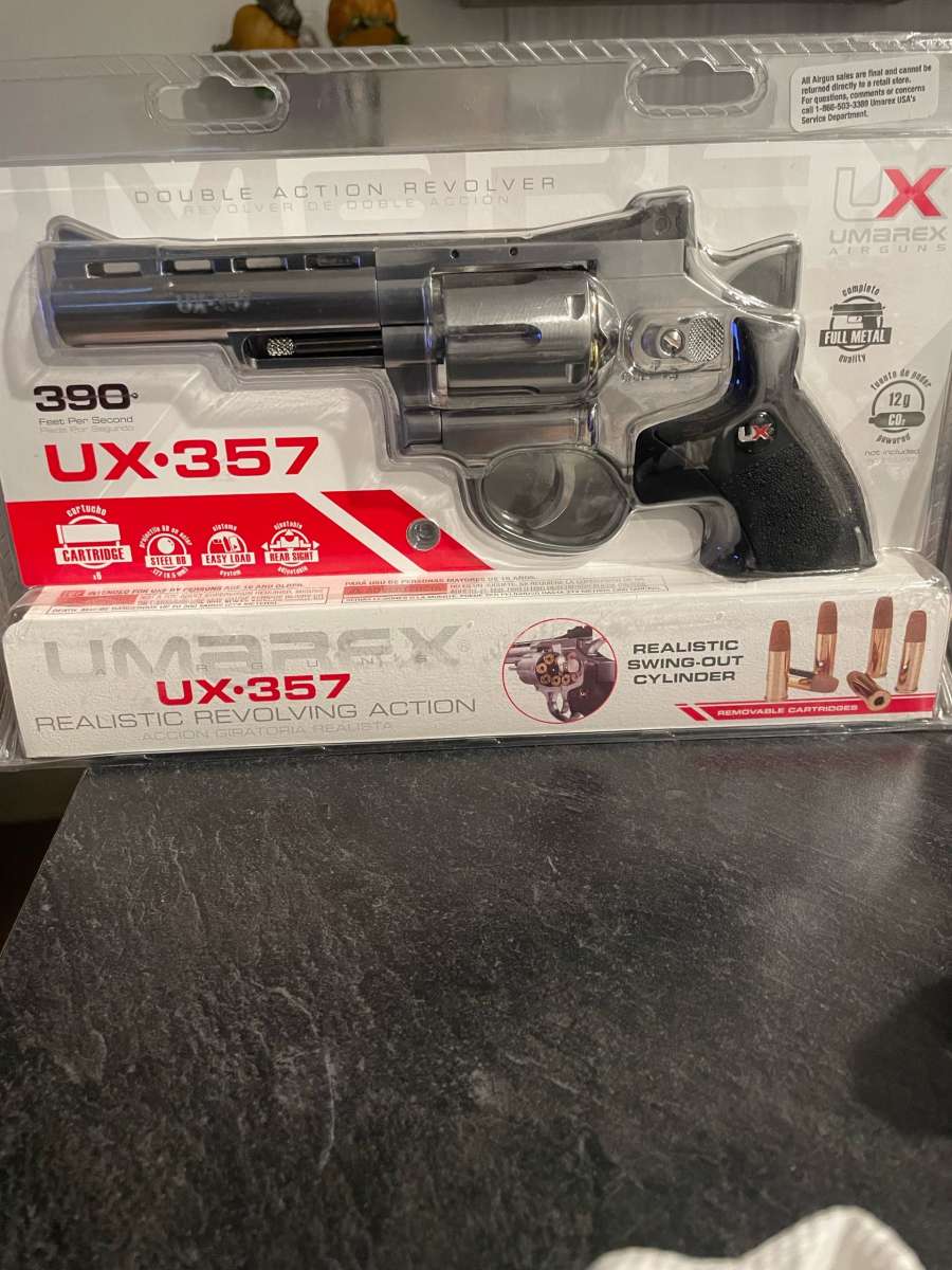 UX357 Brand new never opened realistic