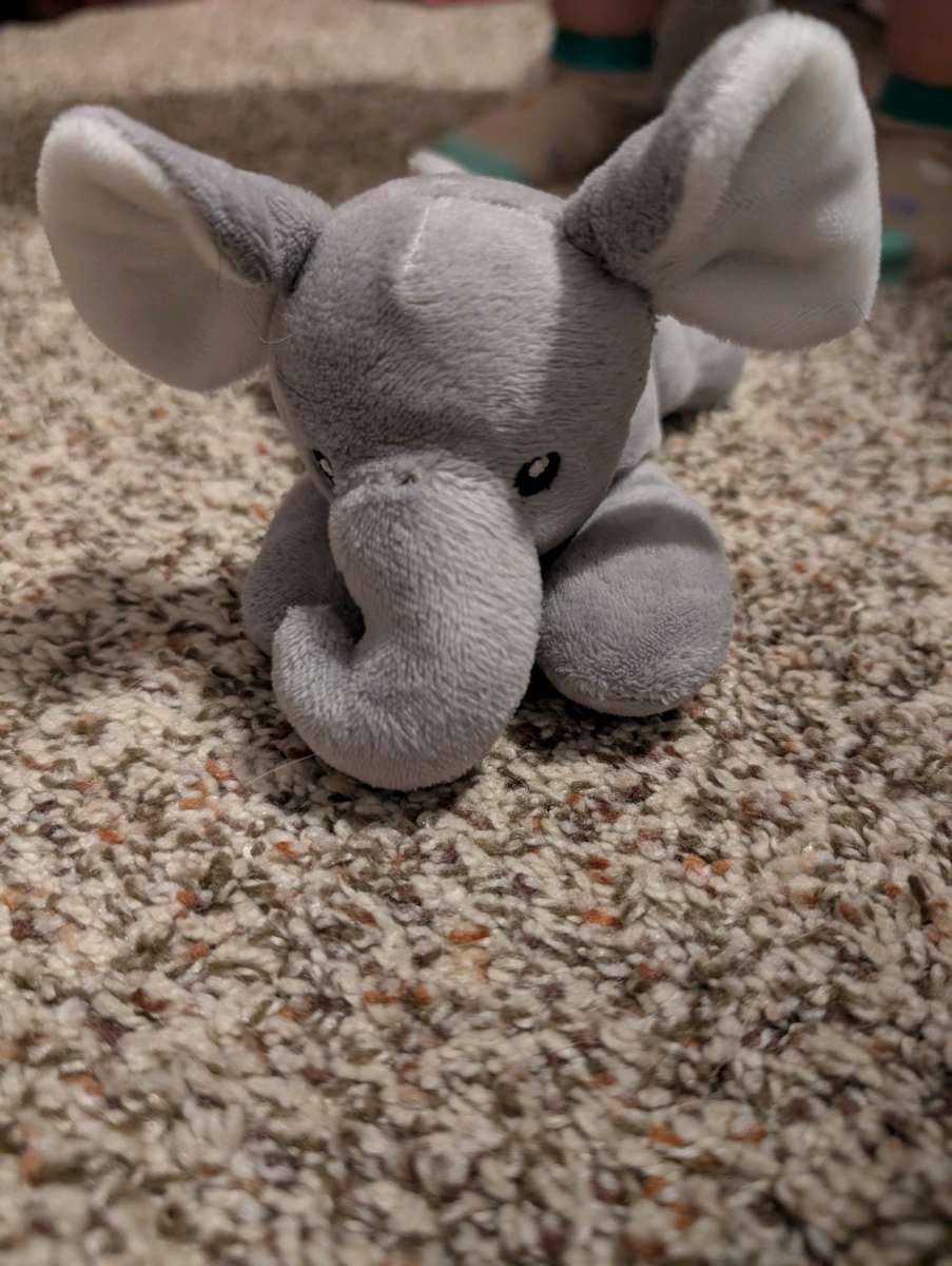 Plush elephant pacifier holder