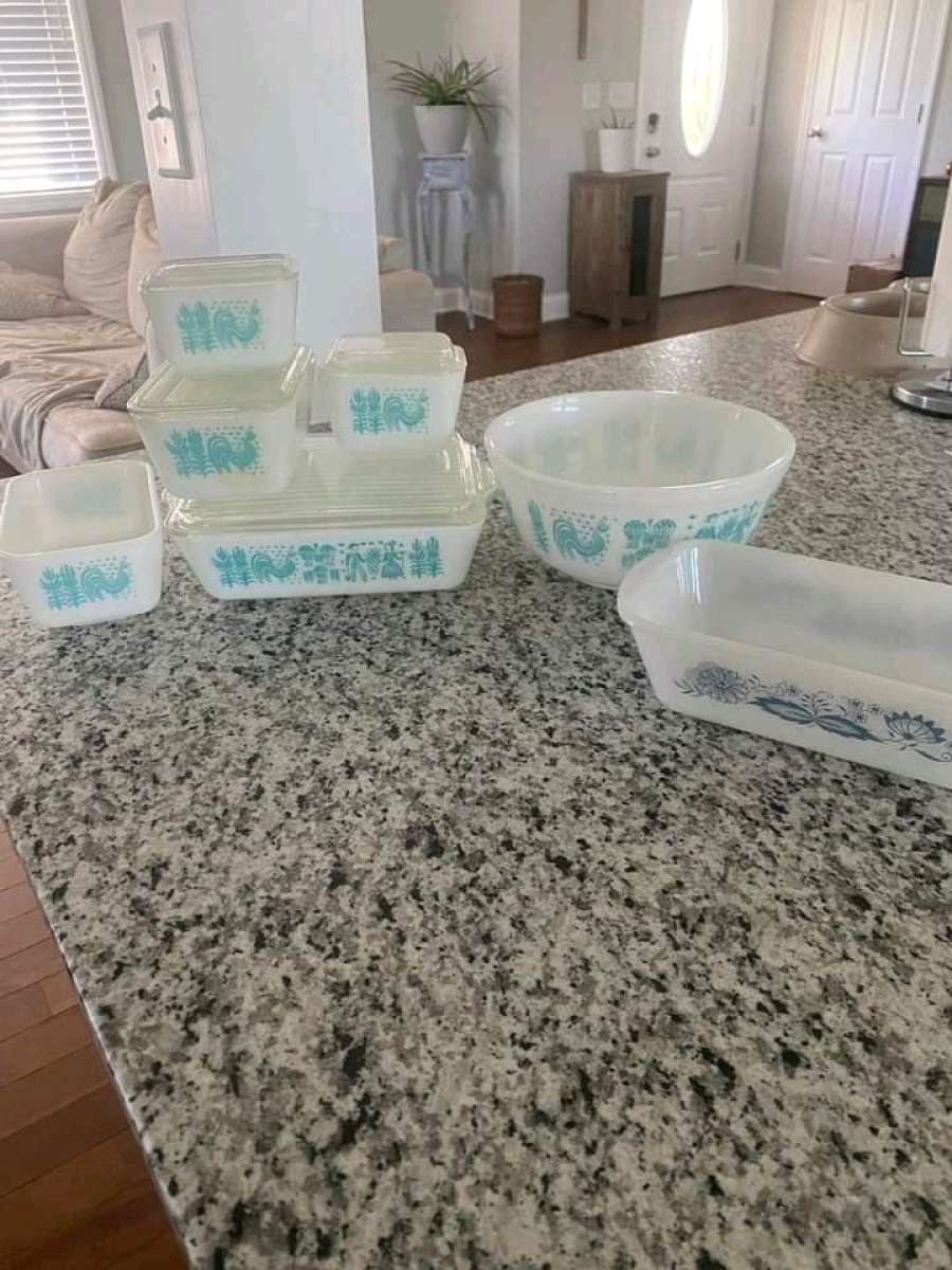 two sets of turquoise Pyrex vintage dishes