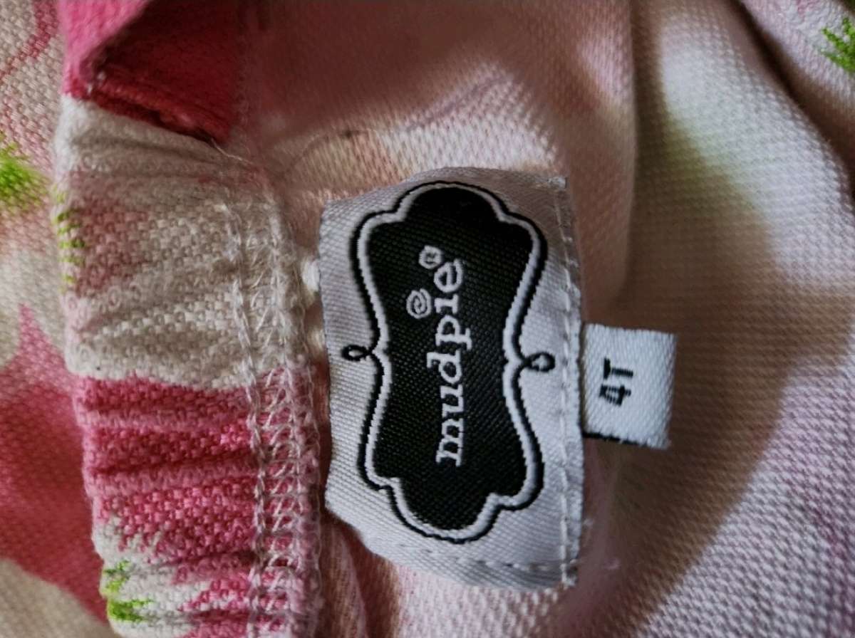 Girl pink dress with green accents