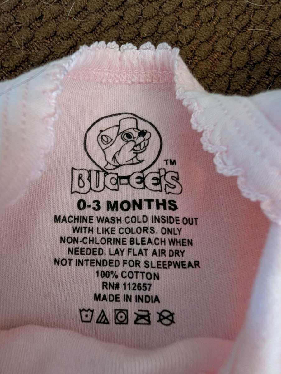 Baby pink Bucee onesie