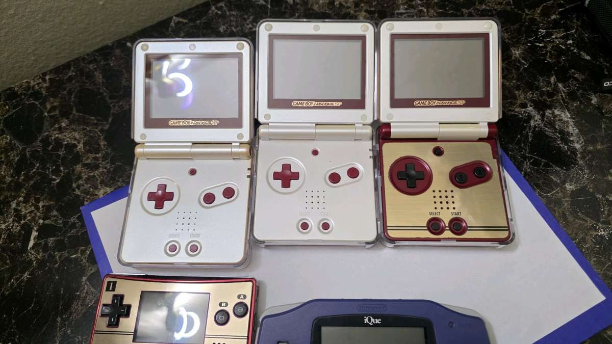 Gameboy advance sp Bundle with games and different consoles