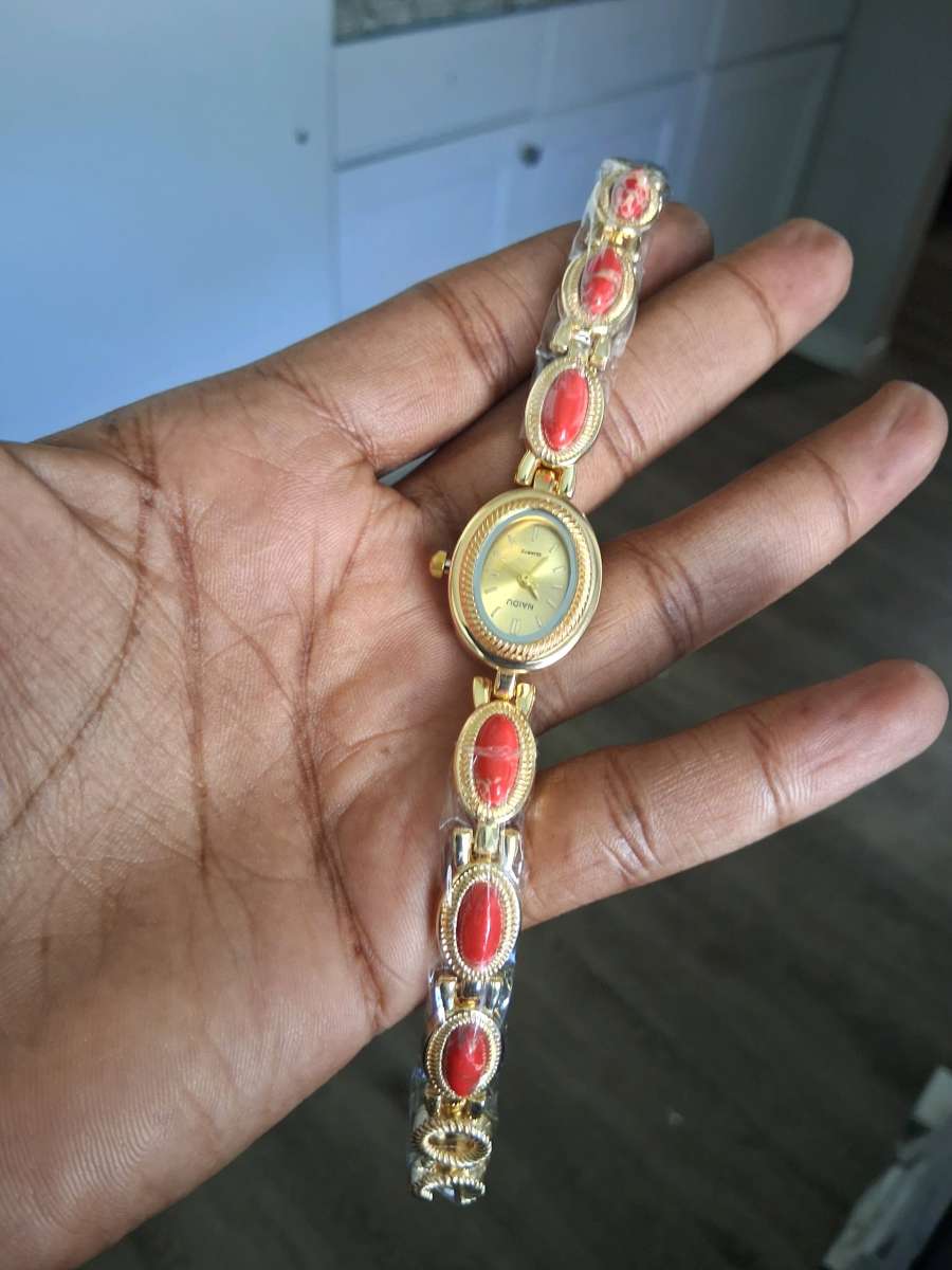 Vintage Gold and red watch with red stones