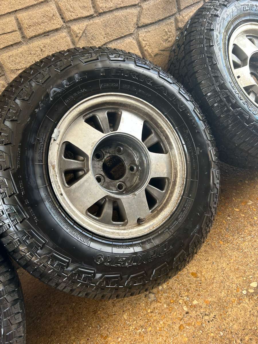 15 in CHEVY RIMS WITH NEW TIRES