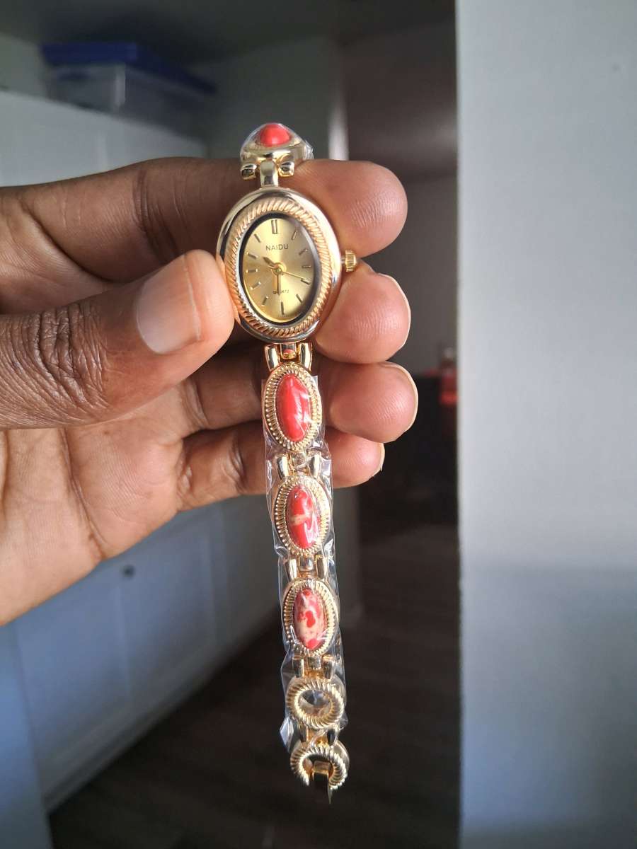 Vintage Gold and red watch with red stones