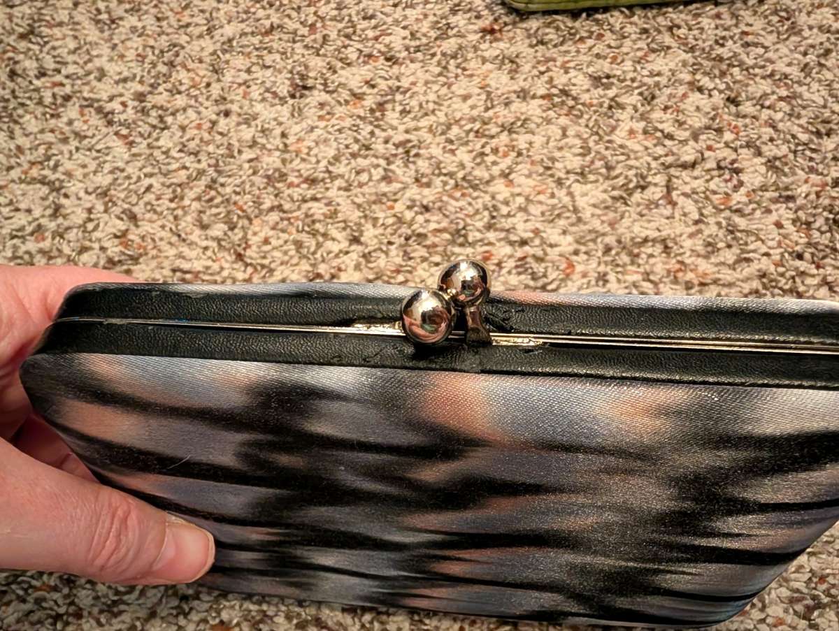 Black and gray with a hint of pink wallet