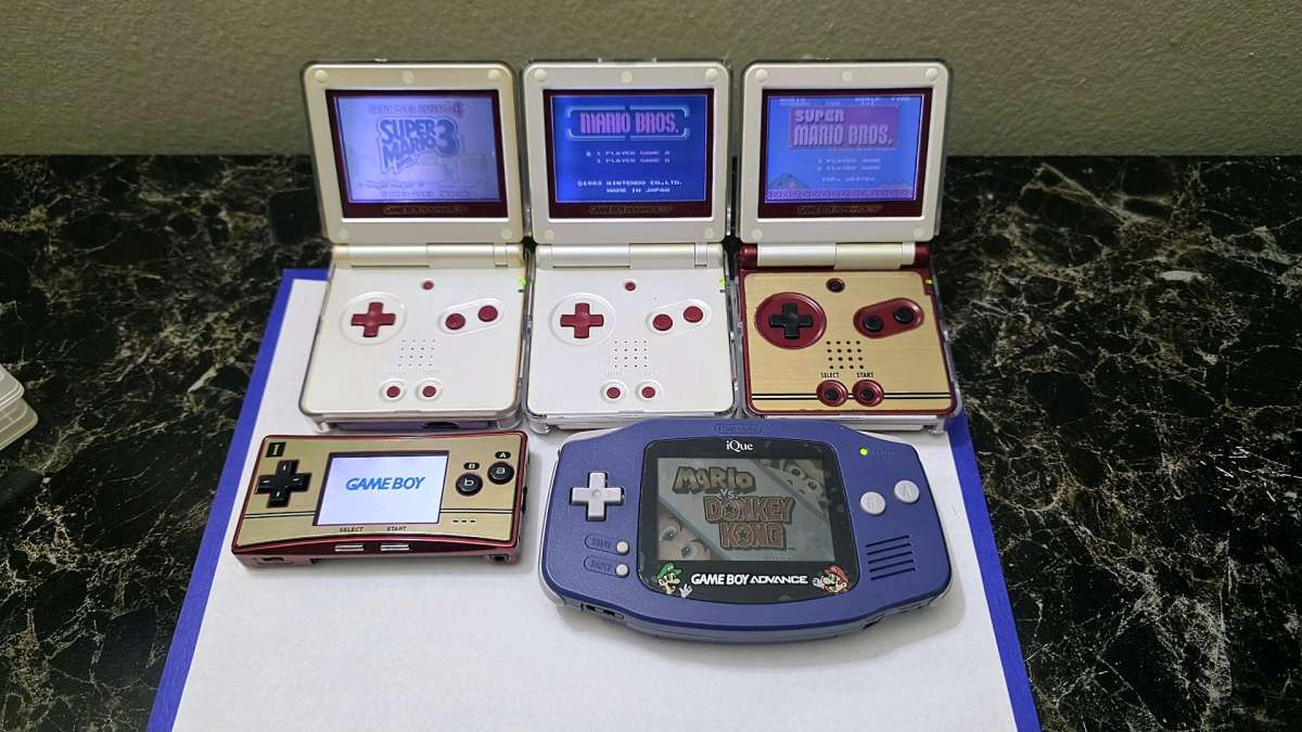 Gameboy advance sp Bundle with games and different consoles