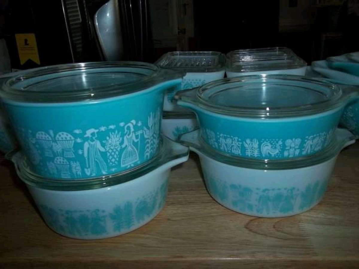 two sets of turquoise Pyrex vintage dishes
