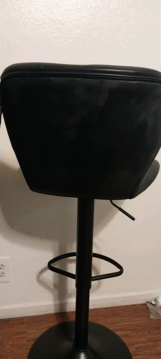 2 black barstools adjustable height
