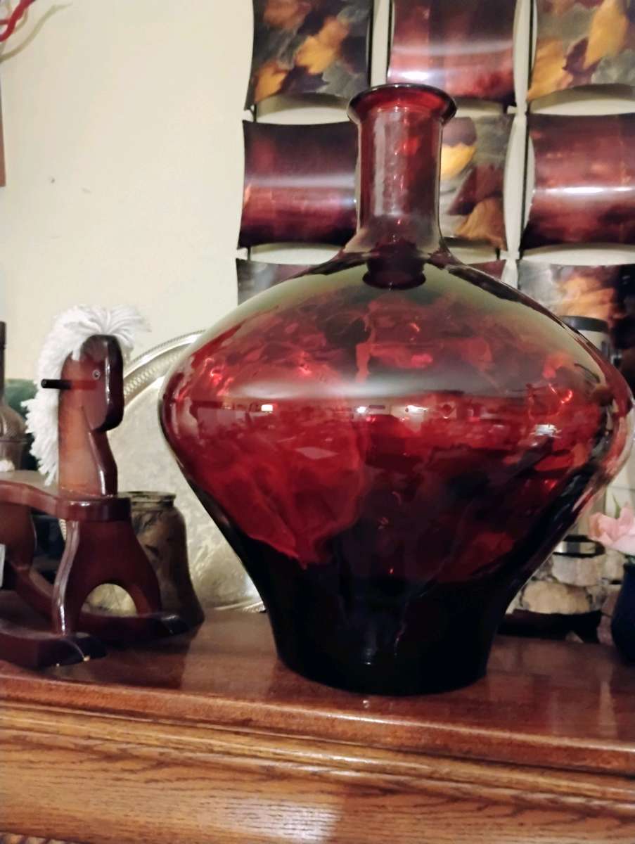 large red quality  glass bottle very heavy