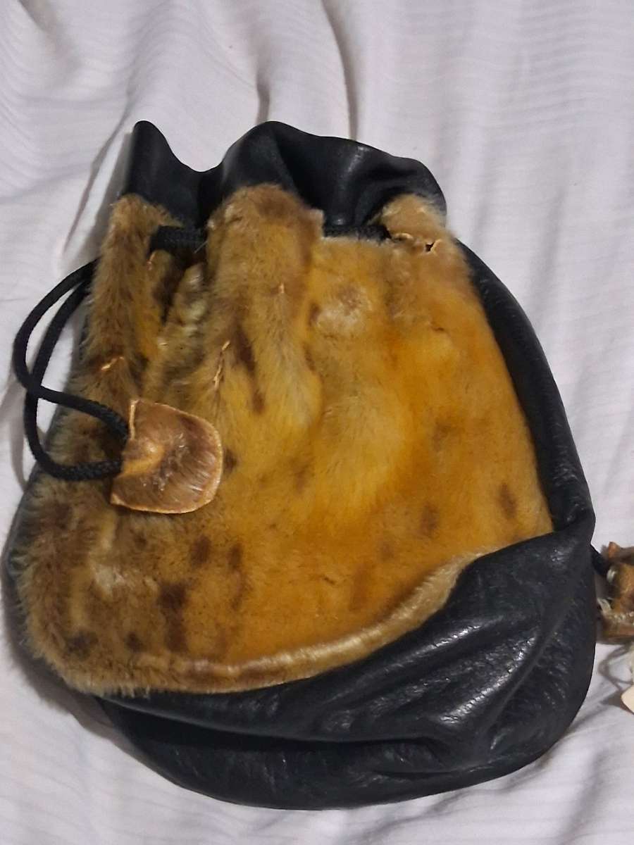 vintage seal skin bag