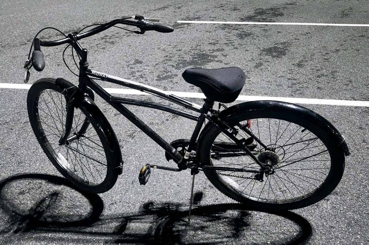 Black Schwinn cruiser bicycle  with carrier