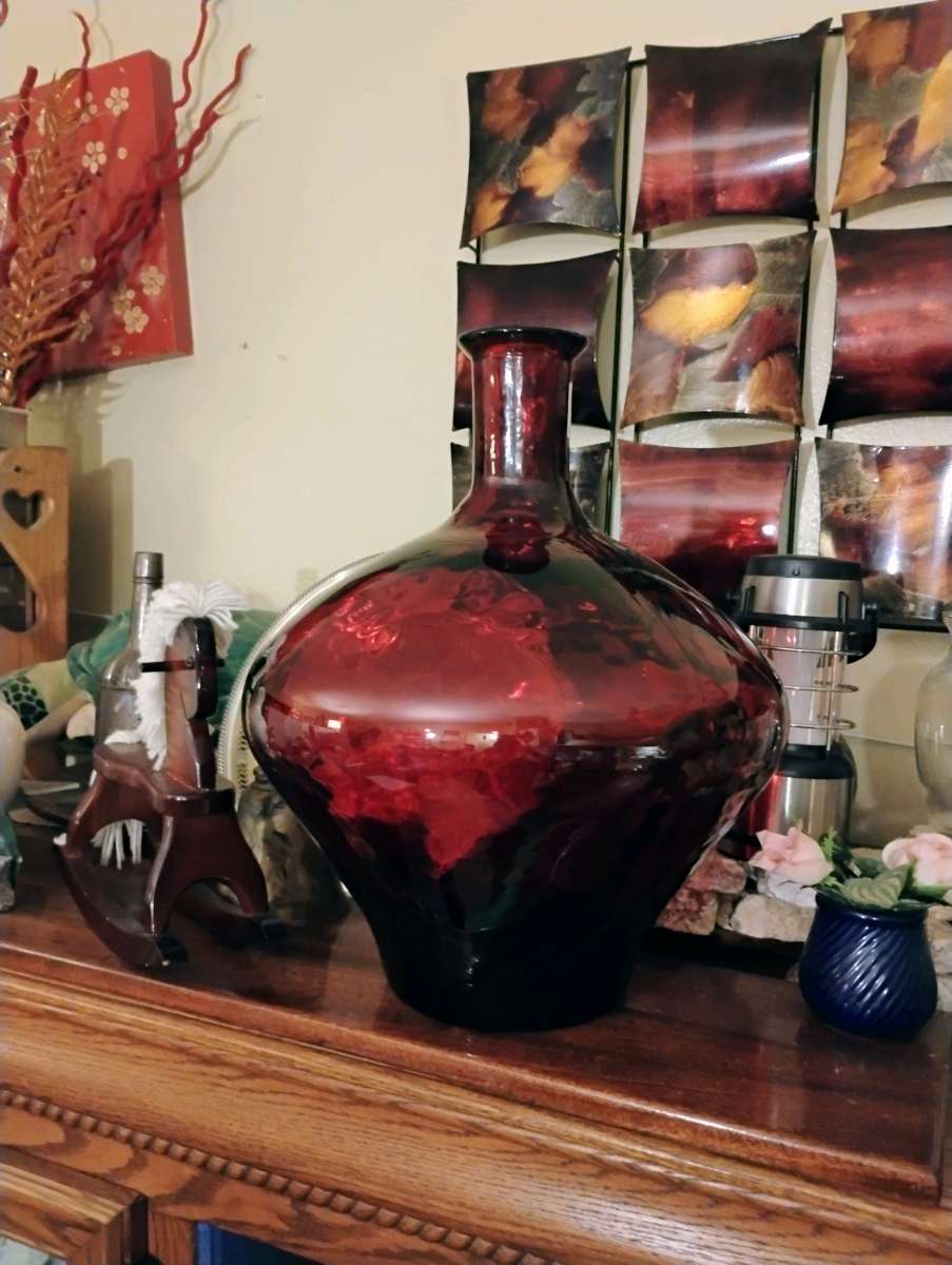 large red quality  glass bottle very heavy