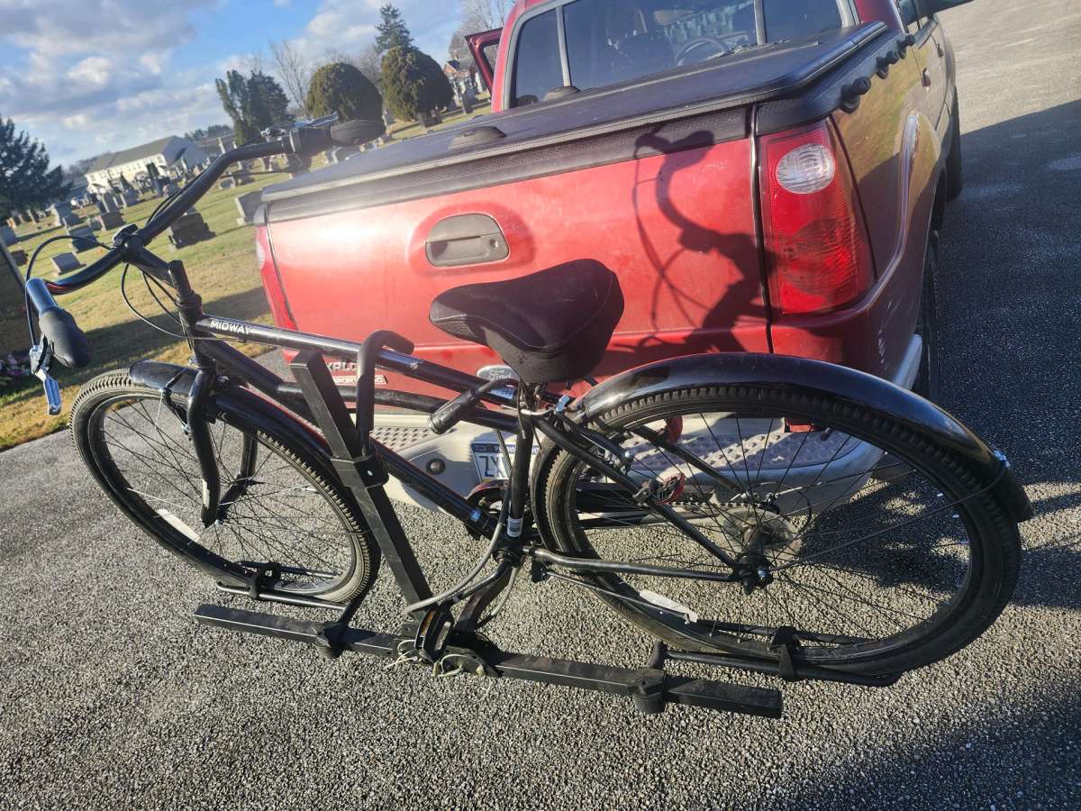 Black Schwinn cruiser bicycle  with carrier