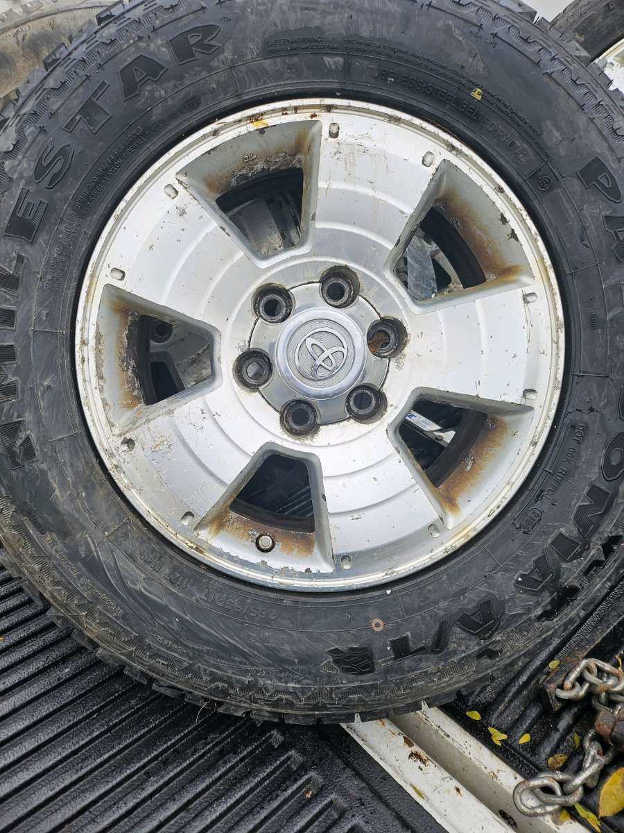 Five toyota tacoma wheels and tires