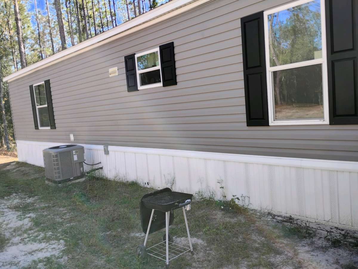 land and a single wide mobile home