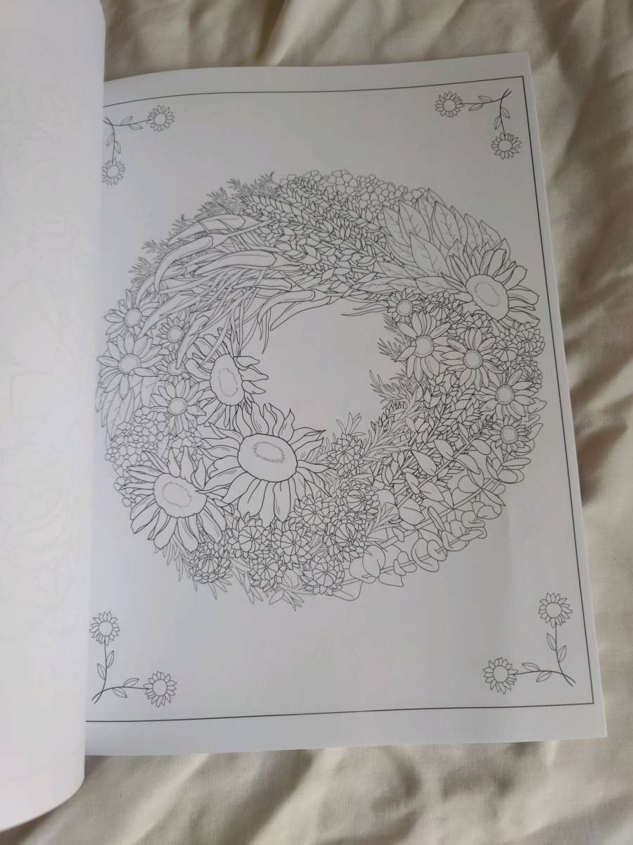 Creative Haven Floral wreaths coloring book