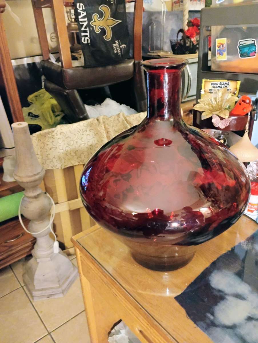 large red quality  glass bottle very heavy