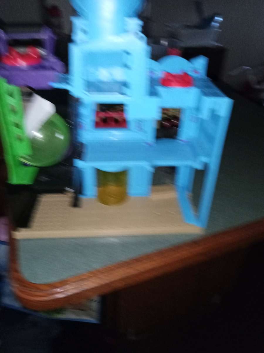 Batman toy castle with one tiny Batman figurine