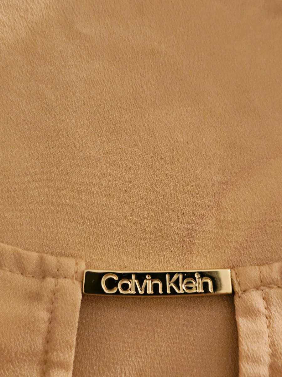 Calvin Klein light peach short sleeve blouse size large