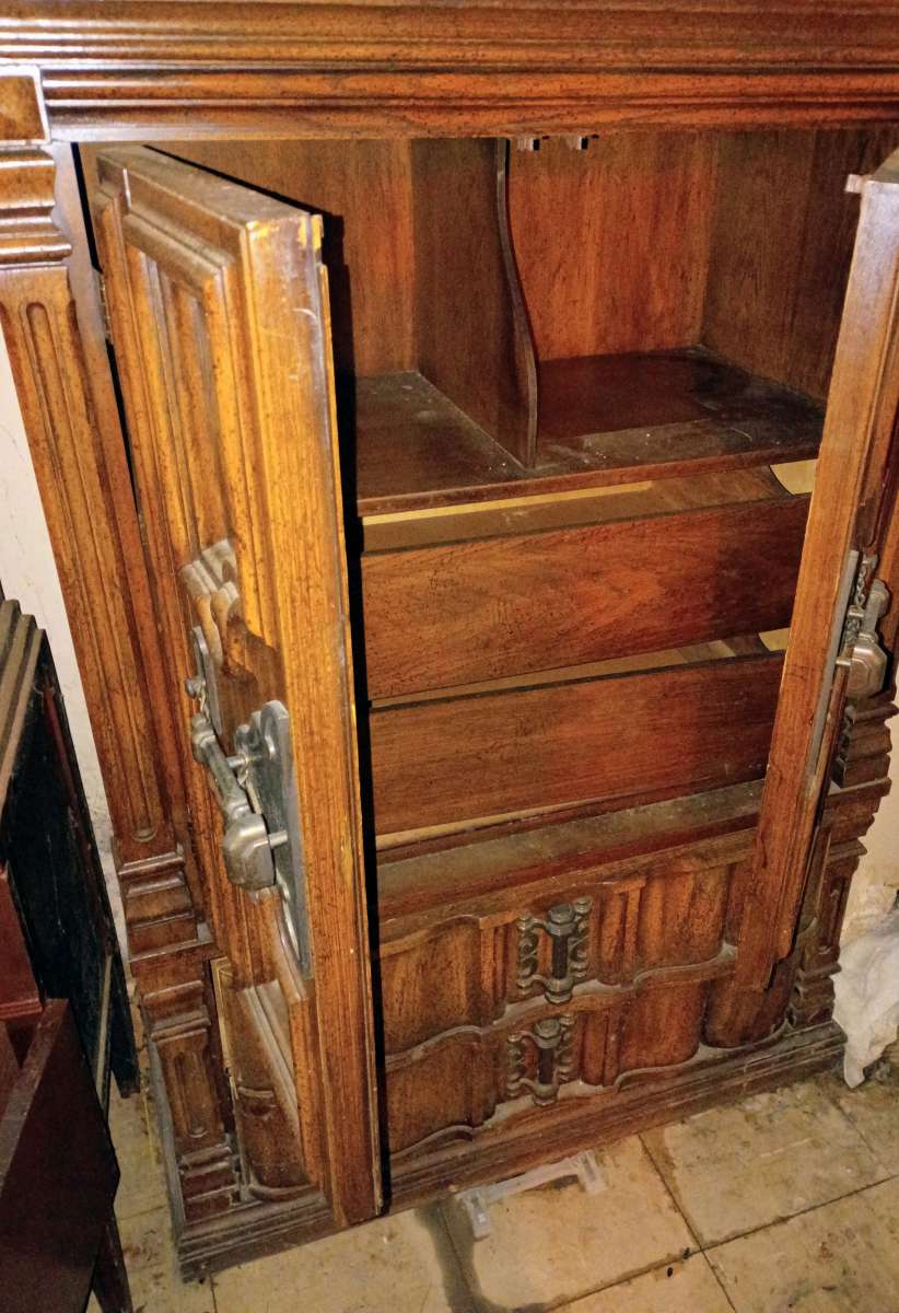 antique wooden cabinet with decorative designs