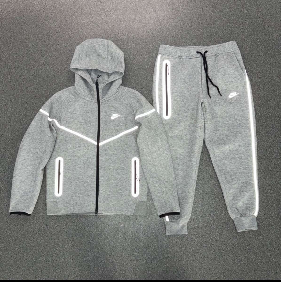 grey Nike tech reflective