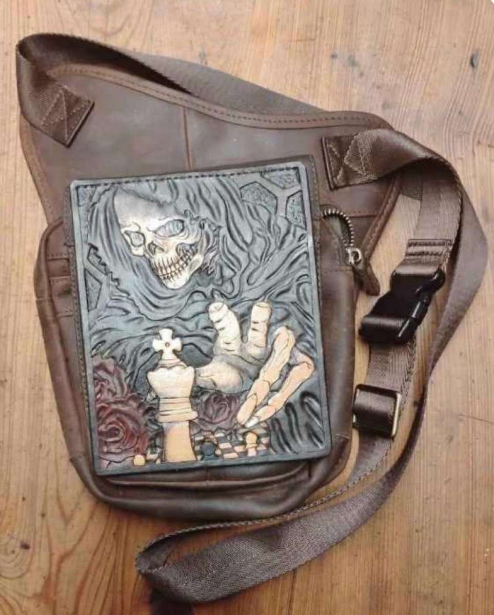 tooled leather grim reaper on a motorcycle hip bag