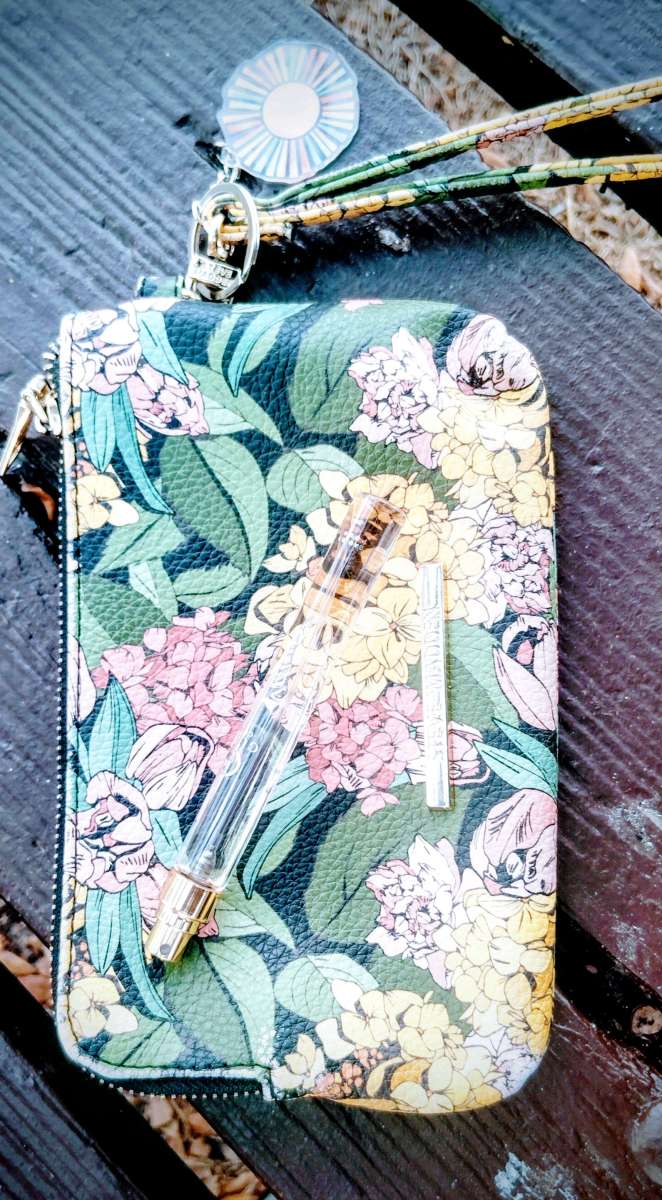 Steve Madden Cosmetic Purse With Free Bottle Of Gucci Perfum