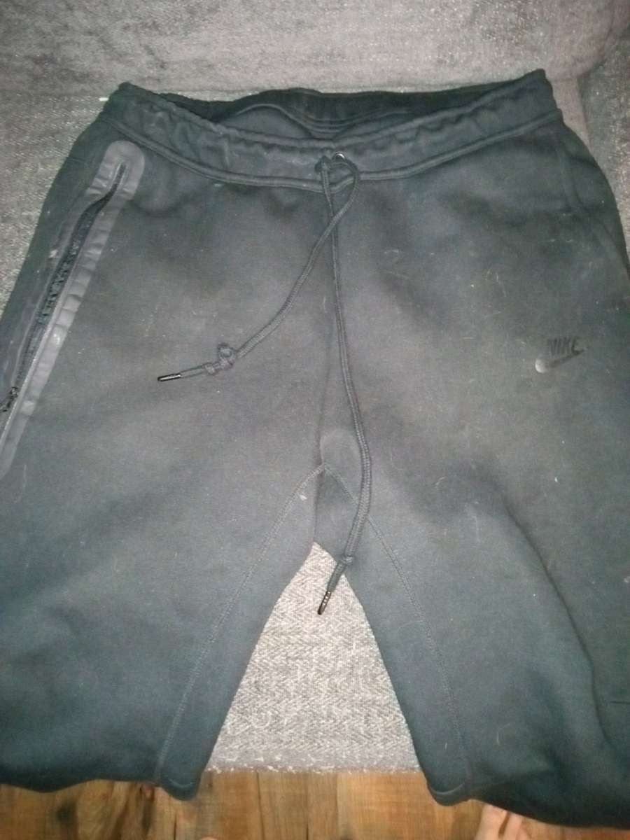 nike tech black pants
