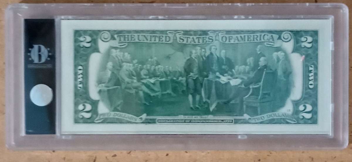 Colored yellow stone national park two dollar bill