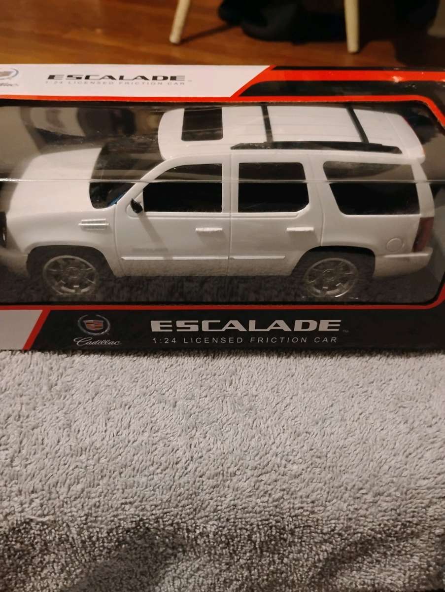Cadillac Escalade 143 license friction car