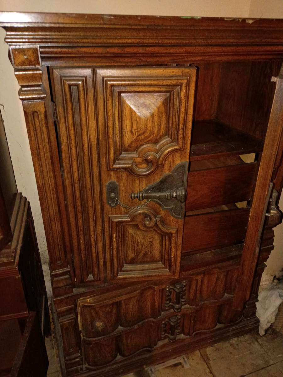 antique wooden cabinet with decorative designs