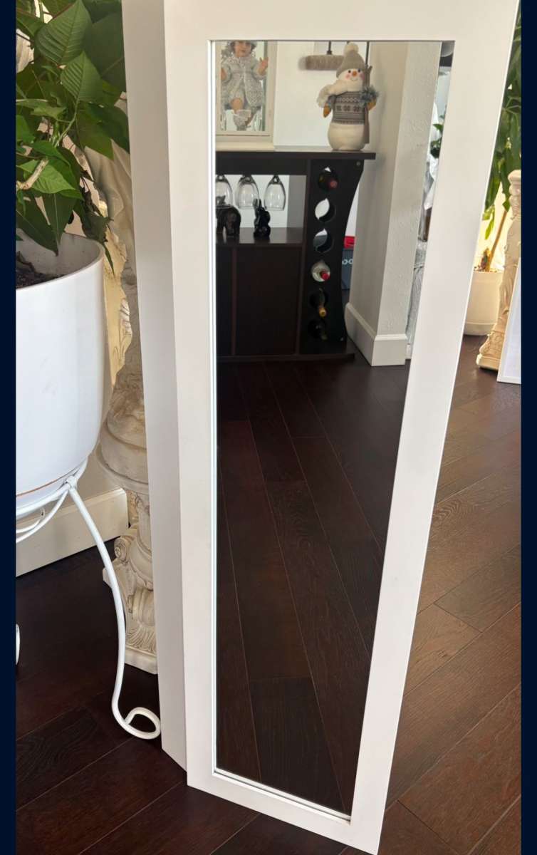 mirror with jewelry storage