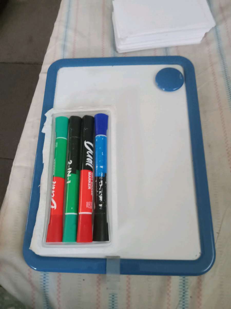 dry erase board with pens
