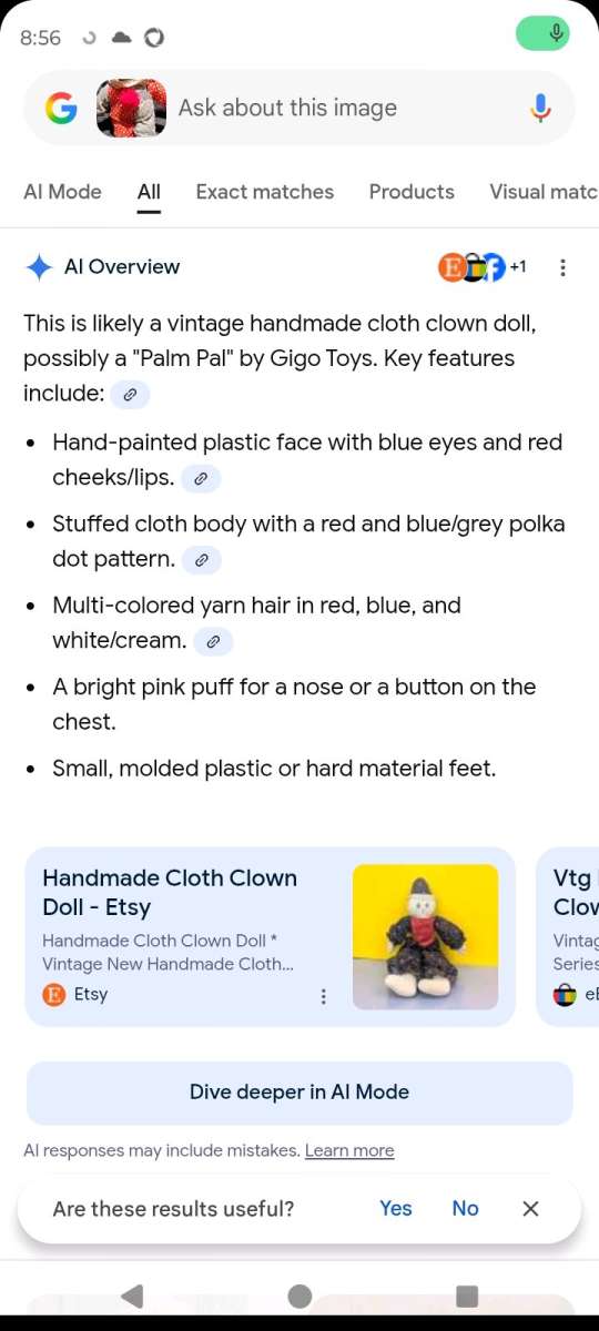 this is a vintage collectible clown doll cloth body vinyl he