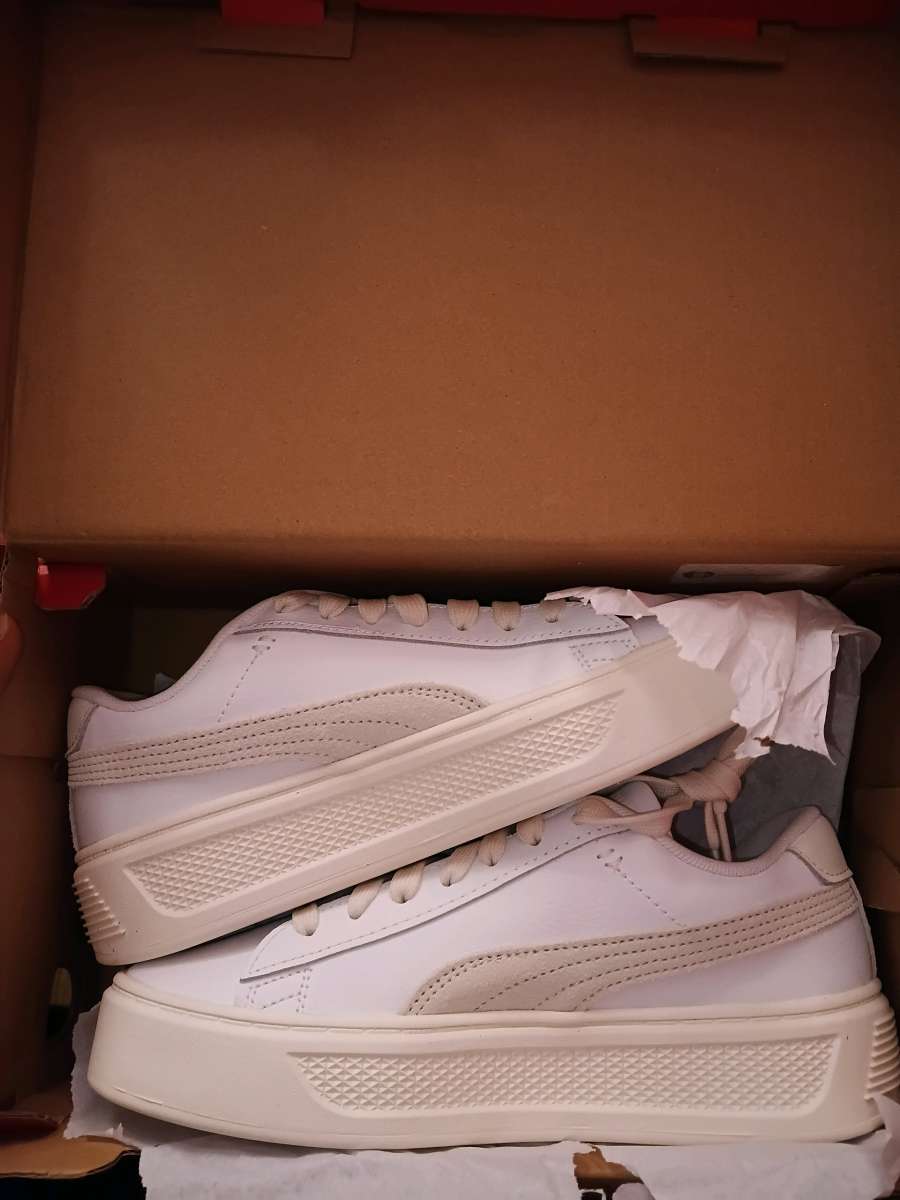 pumas and adidas sneakers