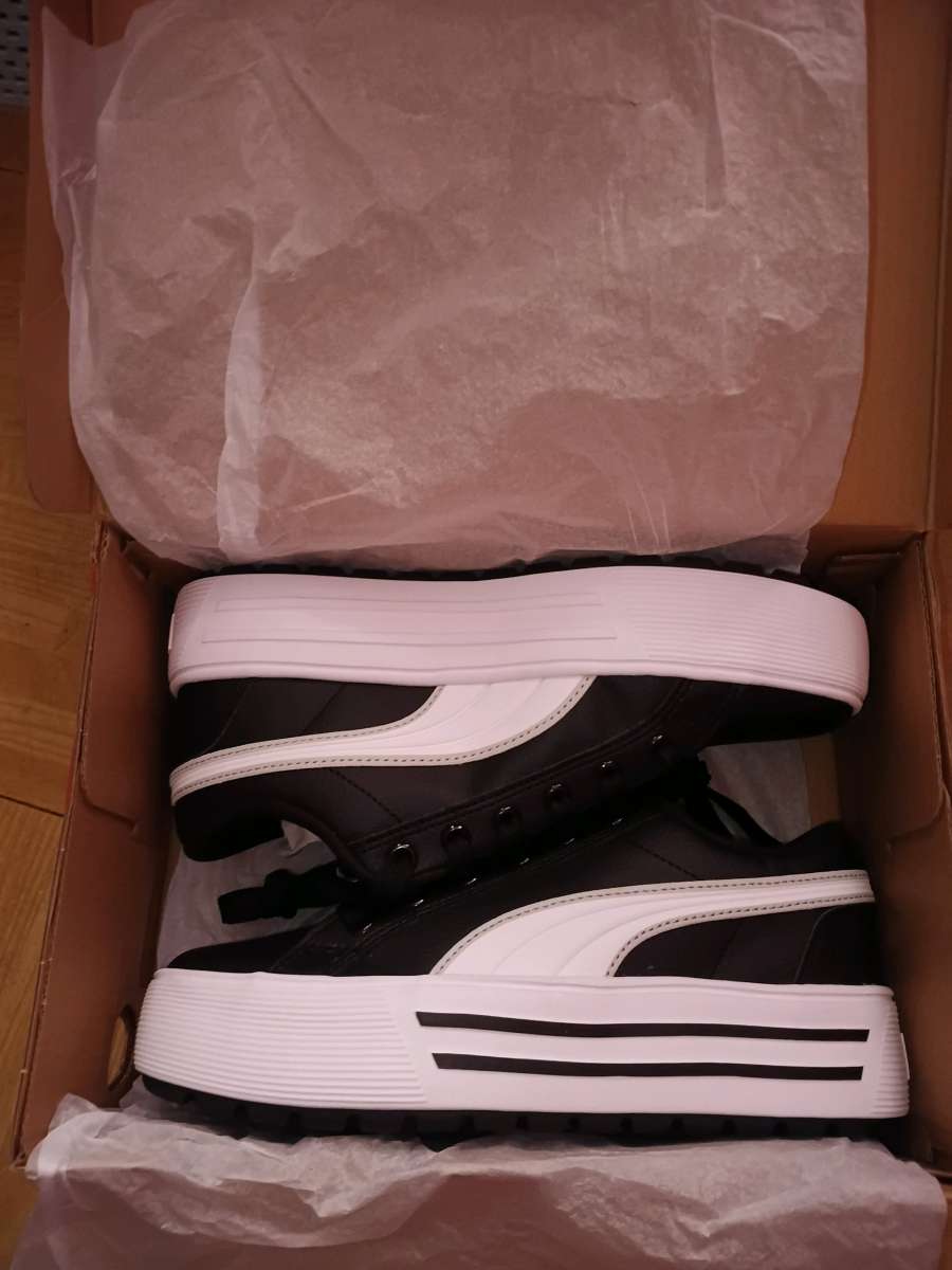 pumas and adidas sneakers