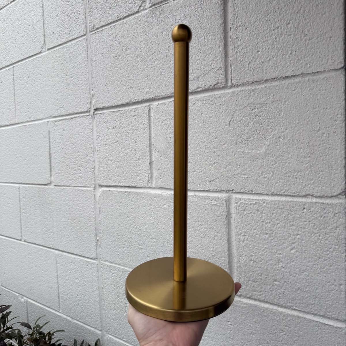 Threshold brass towel holder