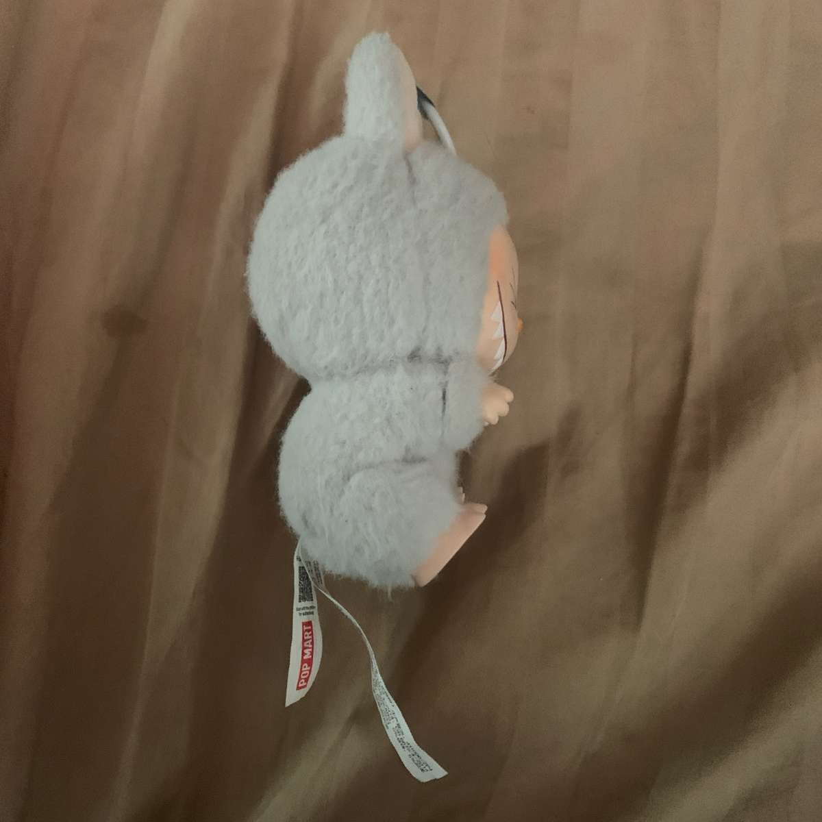 labubu gray have a seat