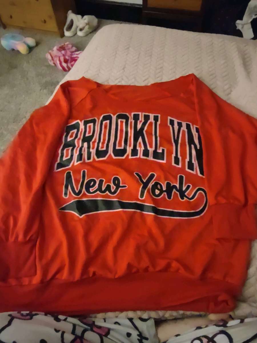 red off the shoulder sweater