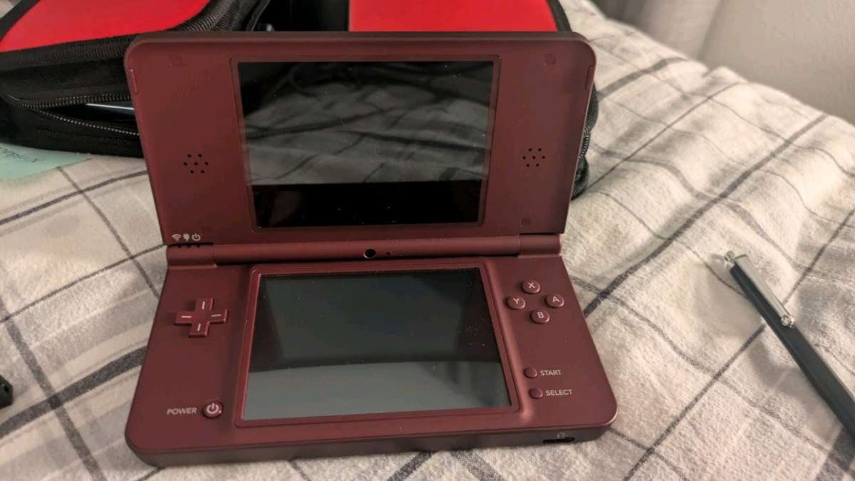 Red Nintendo DSi XL with Case