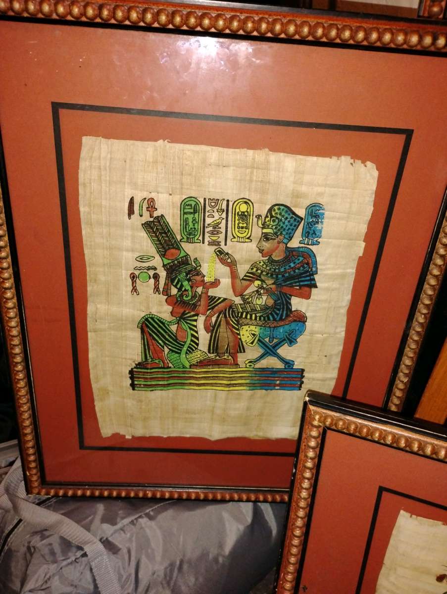 a set of 4 framed Egyptian pictures