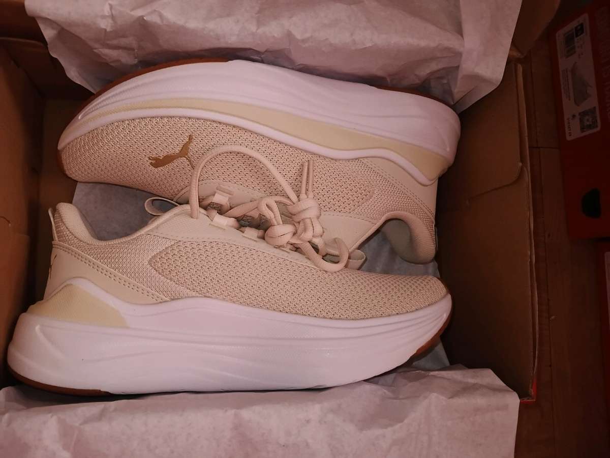 pumas and adidas sneakers